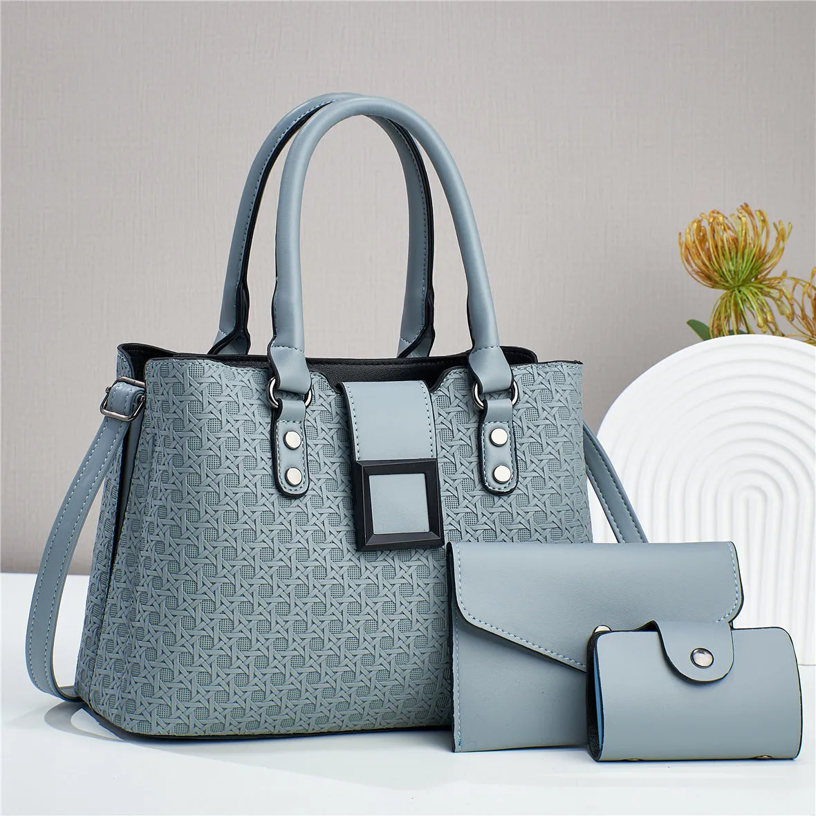 Three-piece textured women's crossbody bag in square vertical shape with weaving detail and single shoulder strap