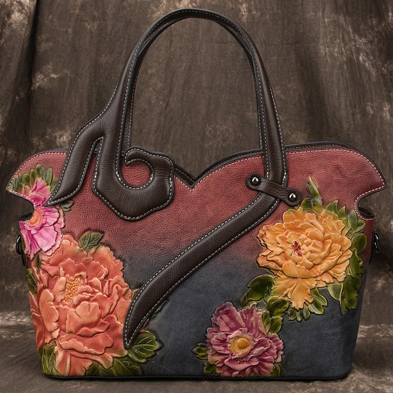 Women's genuine cowhide leather tote bag with floral embossing and zipper closure, horizontal square shape
