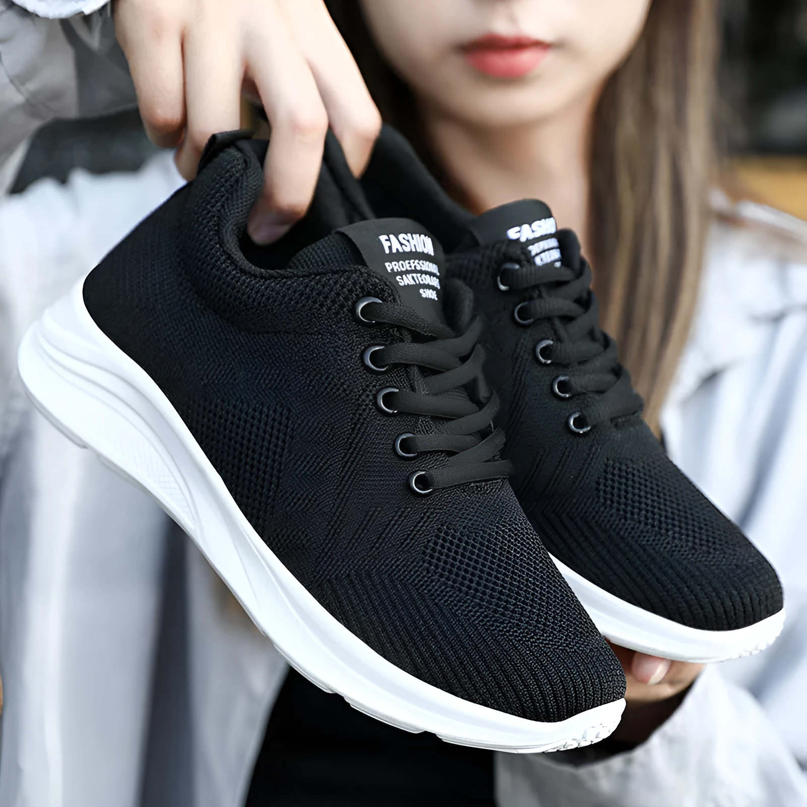 Spring Sole women's casual sports shoes in grey with mesh upper and white PVC sole on a light background