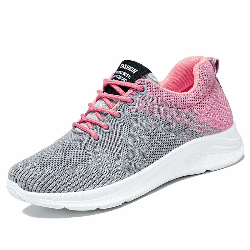 Spring Sole women's casual sports shoes in grey with mesh upper and white PVC sole on a light background