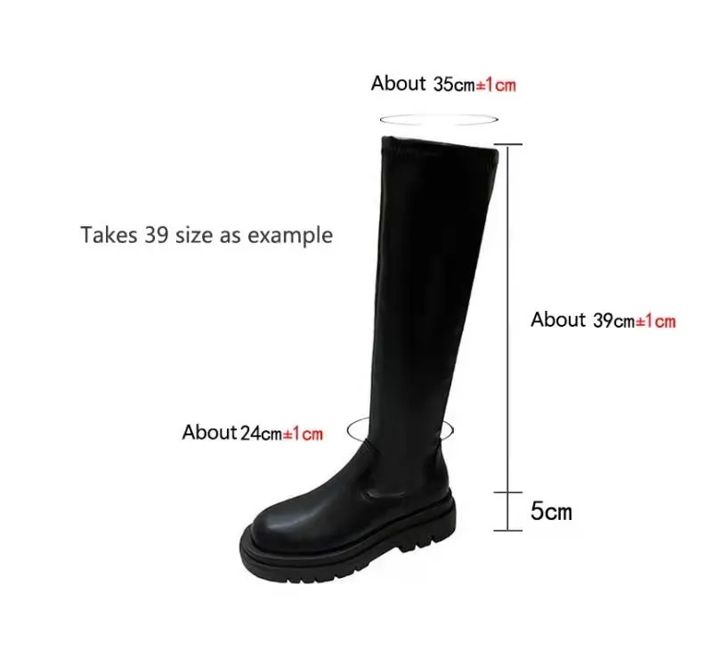Black women's knee high boots with thick chunky sole and round toe on a winter background