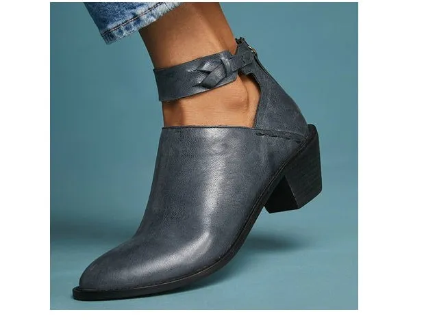 Women's cut out booties with buckle strap and back zipper in black, side view showing vintage round toe and 3-5cm heel