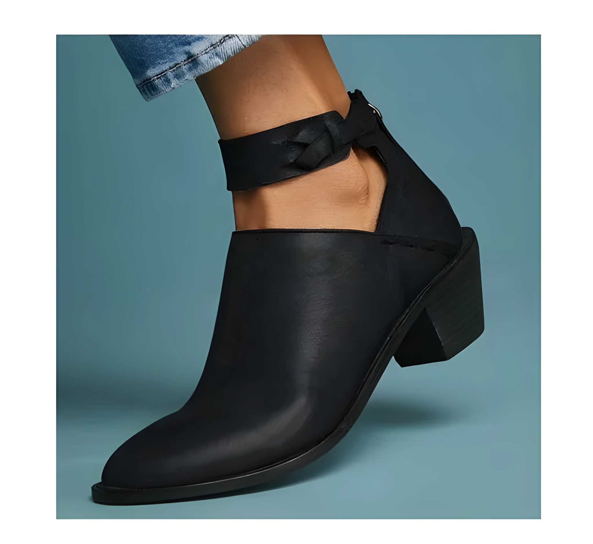 Women's cut out booties with buckle strap and back zipper in black, side view showing vintage round toe and 3-5cm heel