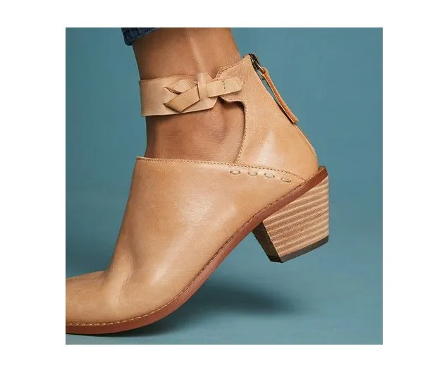 Women's cut out booties with buckle strap and back zipper in black, side view showing vintage round toe and 3-5cm heel