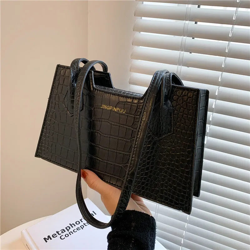 Small square PU handbag with crocodile pattern, sewing line detail, medium hard build, 27x16x7cm, black colour