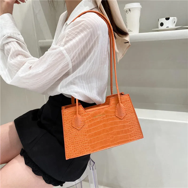 Small square PU handbag with crocodile pattern, sewing line detail, medium hard build, 27x16x7cm, black colour