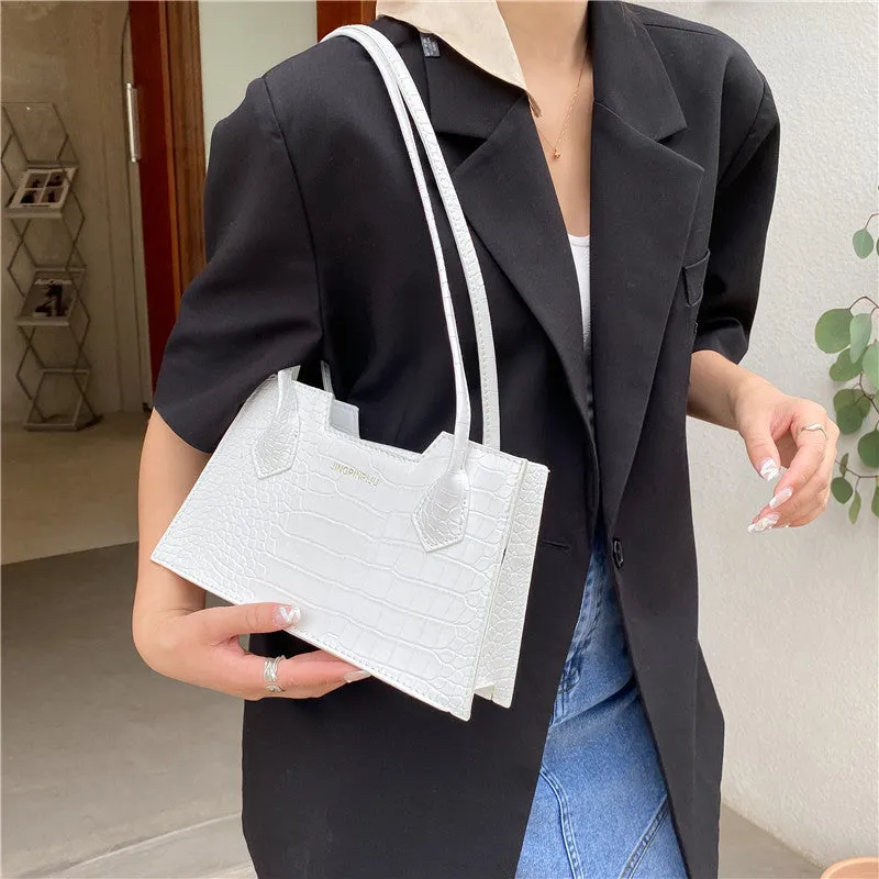 Small square PU handbag with crocodile pattern, sewing line detail, medium hard build, 27x16x7cm, black colour
