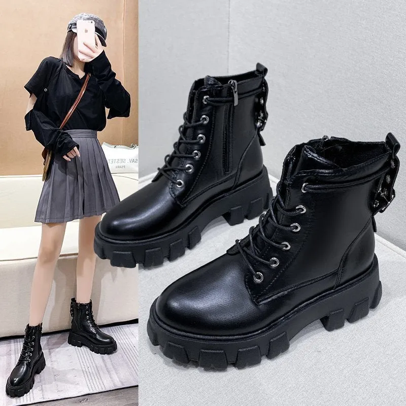 Women's Martin boots in artificial PU with belt buckle and lace front in black, size 38