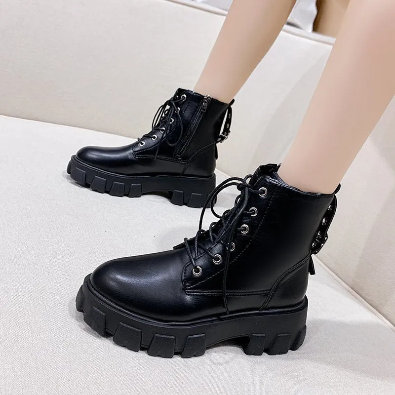 Women's Martin boots in artificial PU with belt buckle and lace front in black, size 38
