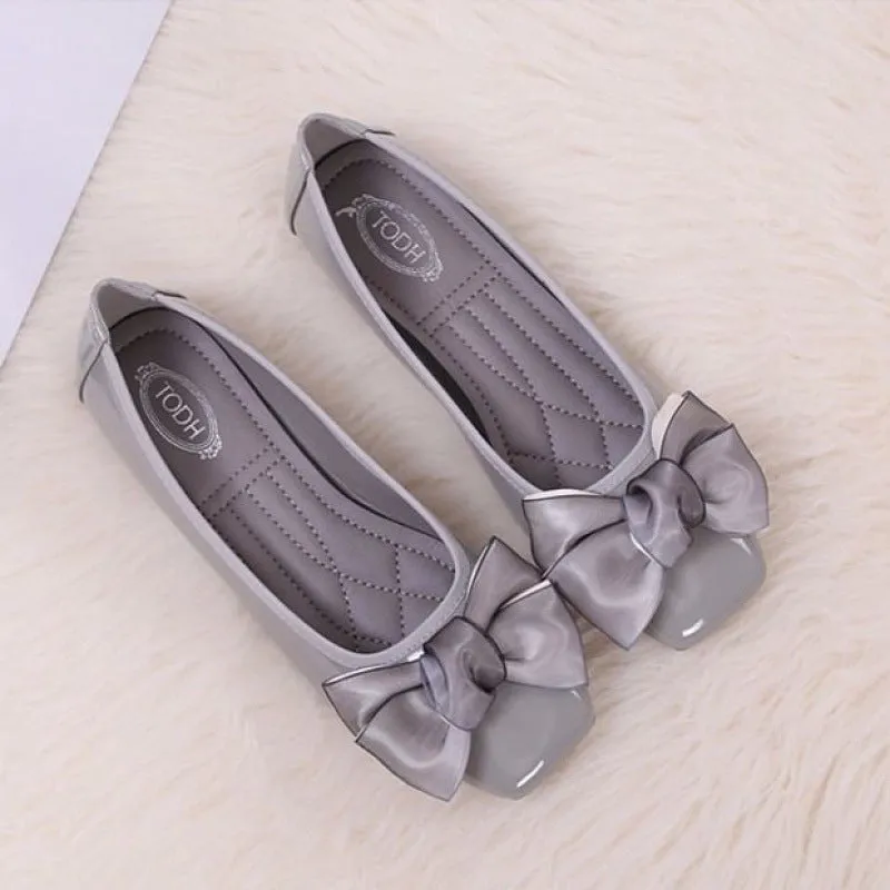 Women's slip-on square toe ballet flats in black with PU upper and low heel