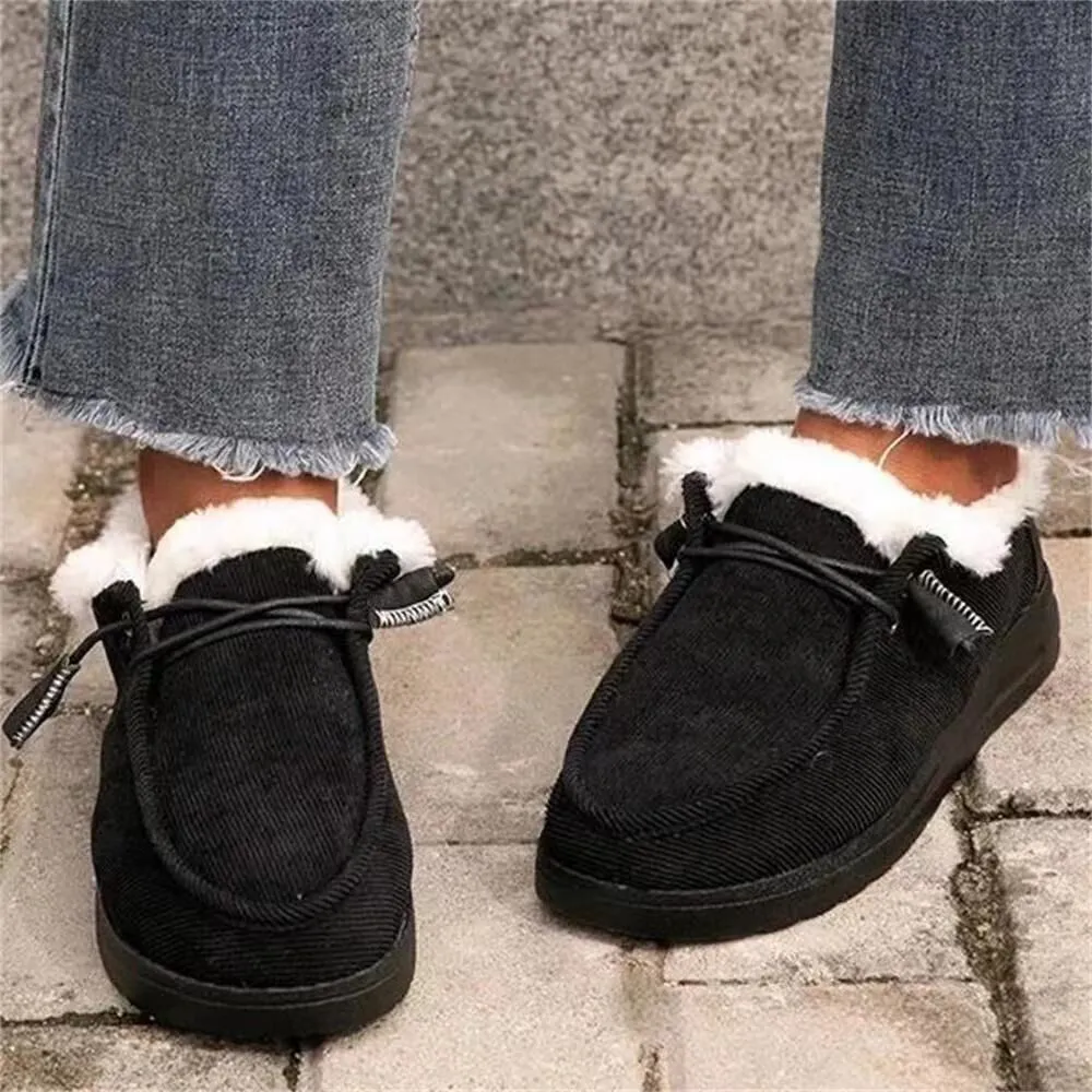 Women's winter snow boots with cotton upper and plush lining in grey, side view showing front-tie lacing and ankle height