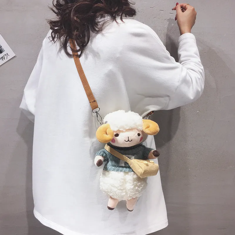 Little Sheep plush crossbody bag showing lamb pattern, square shape, and soft handle in blue colour