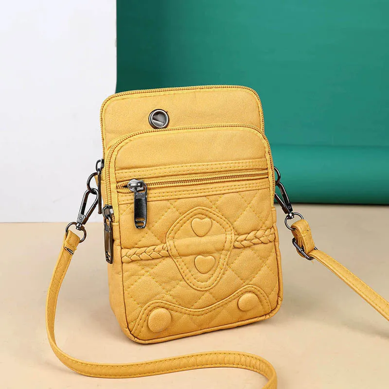 Women's PU leather strapped shoulder bag in vertical square shape, solid colour, with zipper closure and internal pockets