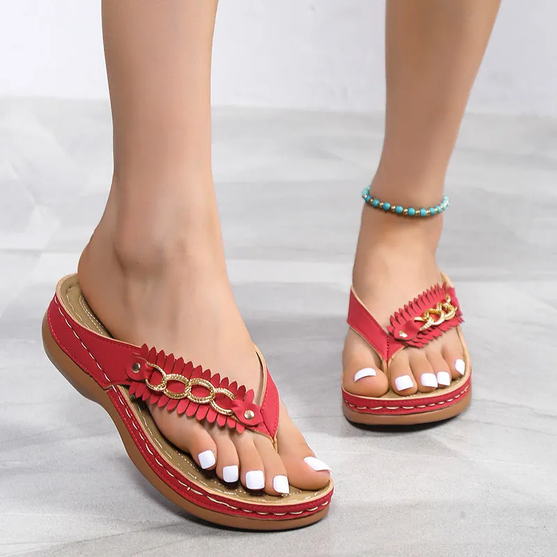 Women's anti-slip wedge sandals with chain detail in black, dark brown, and red on a light background