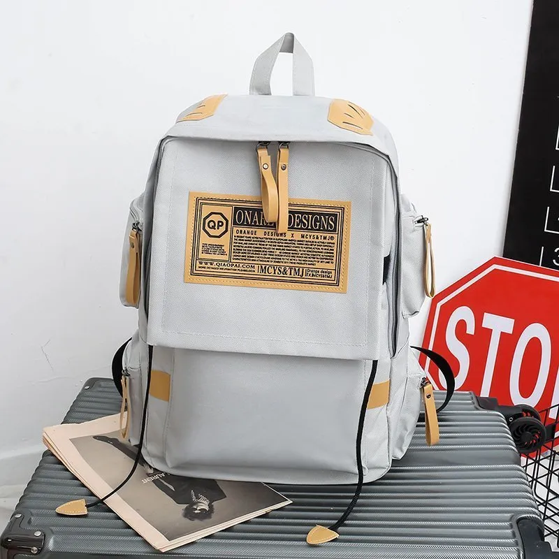 Ins fashion multi-pocket large capacity backpack in waterproof oxford cloth, available in several colours