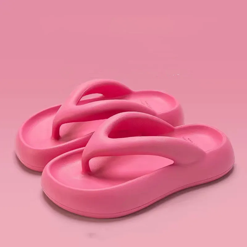 A pair of solid colour thick-soled EVA flip-flops with a bow detail, shown on a light background.