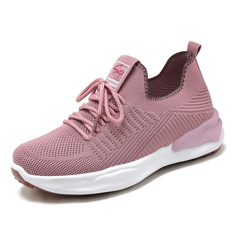 Women's breathable mesh running trainer in white, round toe, flat heel, lace-up