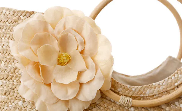 Natural primary colour woven straw bag beach bag handbag with shoulder straps on white background