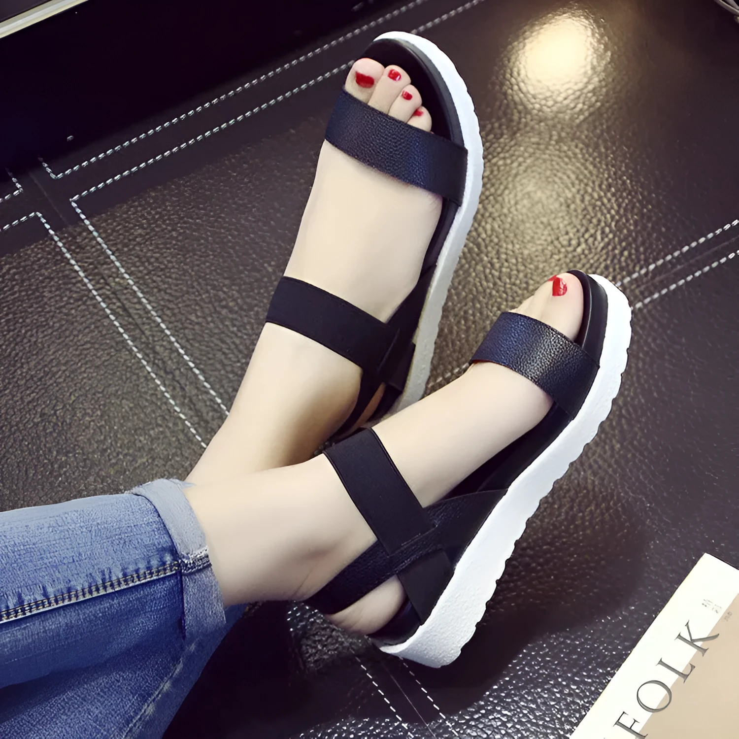 Women's elastic wedge sandals in black with low heel and round toe