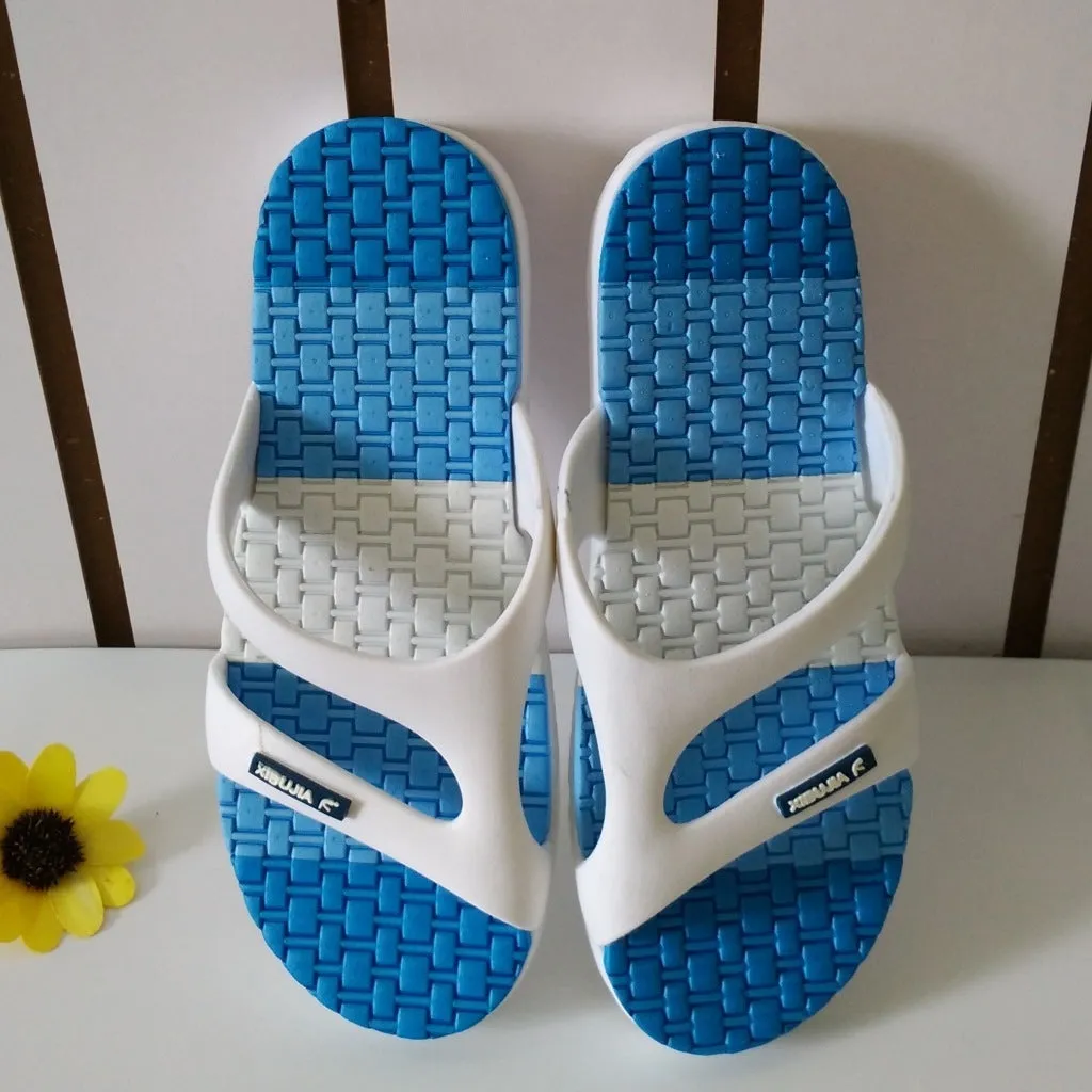 Men's blue summer home slippers with open toe and cotton-linen style upper on a balcony floor