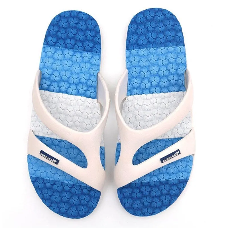 Men's blue summer home slippers with open toe and cotton-linen style upper on a balcony floor
