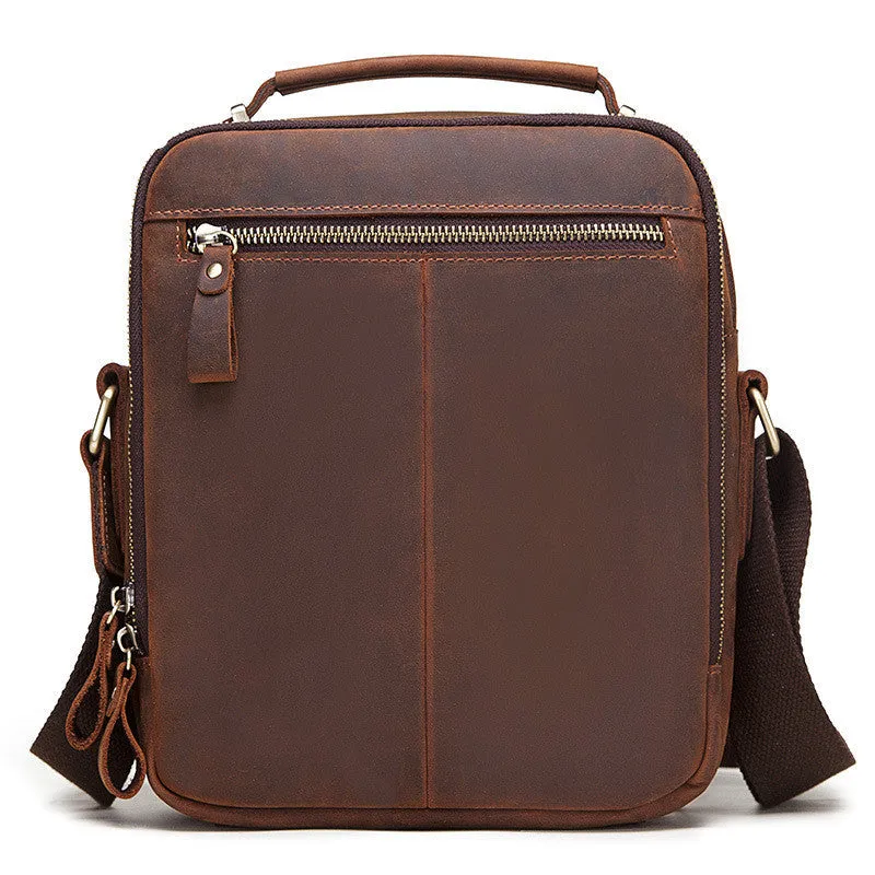 Men's brown Crazy Horse leather crossbody bag with sewing line details and shoulder strap