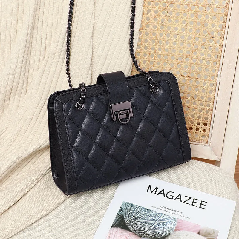 Women's black genuine leather chain crossbody square bag, soft underarm handbag on model