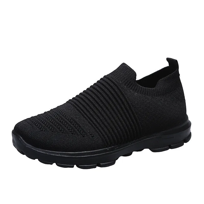 Women's knit sock shoes in beige with breathable upper, round toe, and low rubber sole