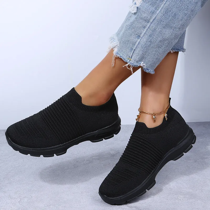Women's knit sock shoes in beige with breathable upper, round toe, and low rubber sole