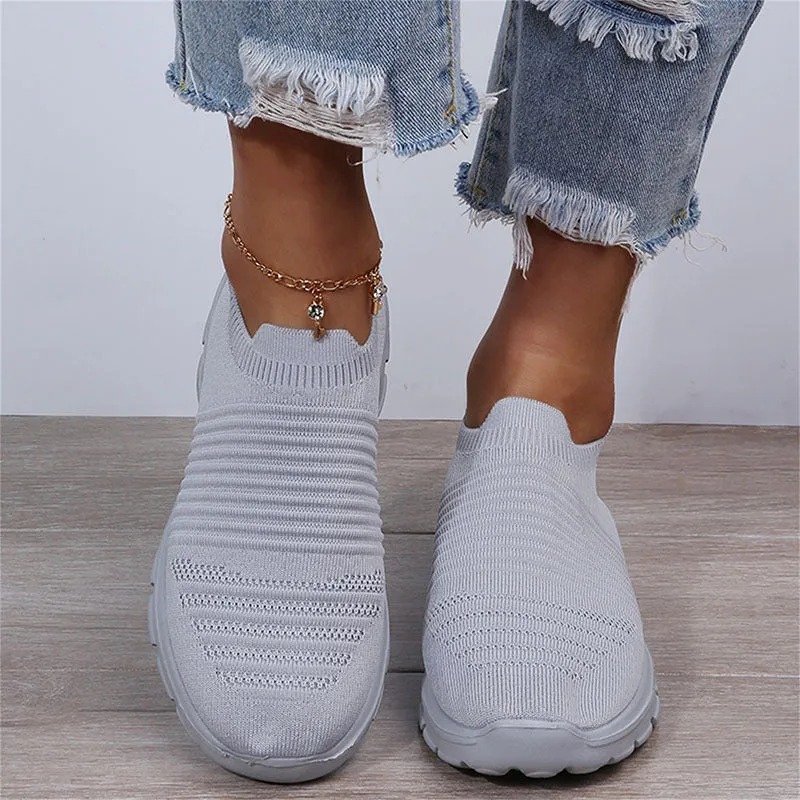 Women's knit sock shoes in beige with breathable upper, round toe, and low rubber sole
