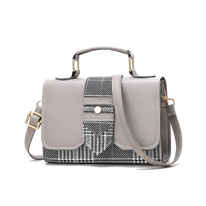 Fashion woman handbag in soft PU with shoulder strap, side view showing polyester lining