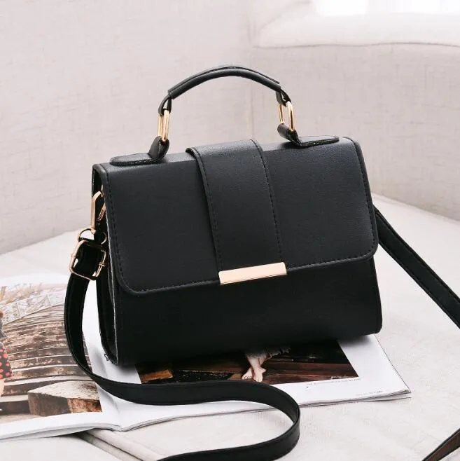 Fashion woman handbag in soft PU with shoulder strap, side view showing polyester lining