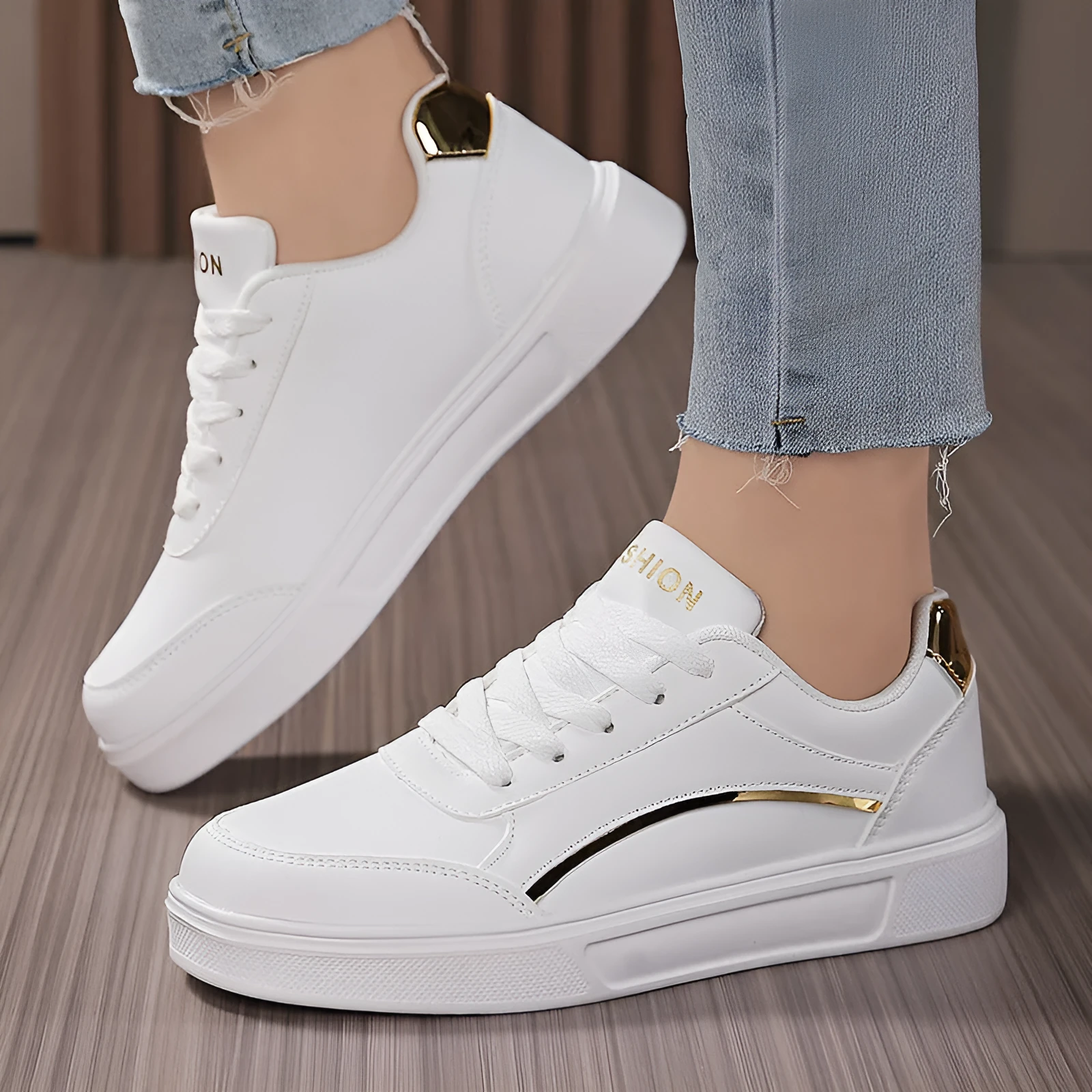 Breathable low-top ladies sneaker with round toe, non-slip rubber sole, and embroidered imitation superfine fibre upper in platinum colour