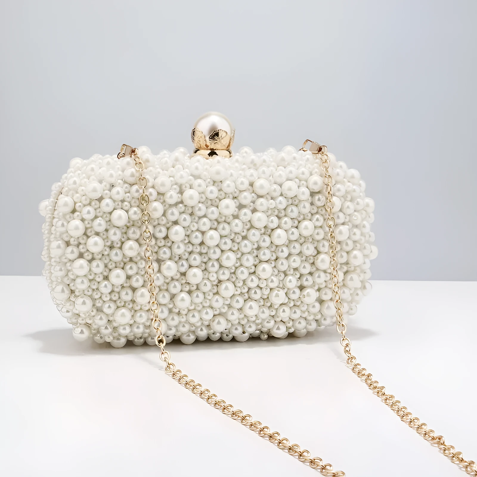 Small pearl dinner bag in solid colour, ABS material, polyester, with single handle and cover-type opening