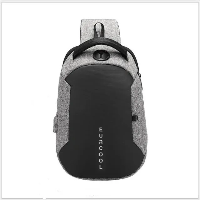 Men's black Oxford crossbody chest bag with USB charging port and multiple zippered compartments