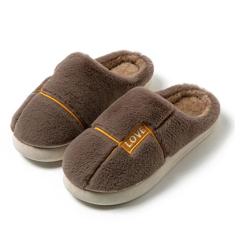 Women's furry indoor slippers in solid colour with plush upper, rubber sole, and wrapped toe, available in multiple colours