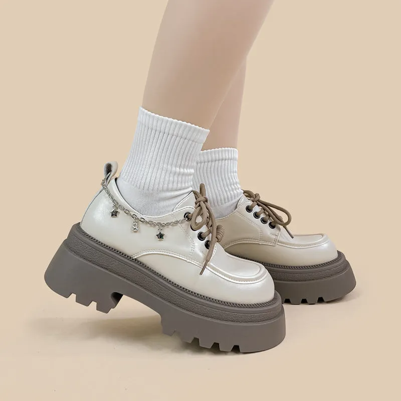 White women's platform Mary Jane shoes with round toe, front lace-up, and a chunky heel