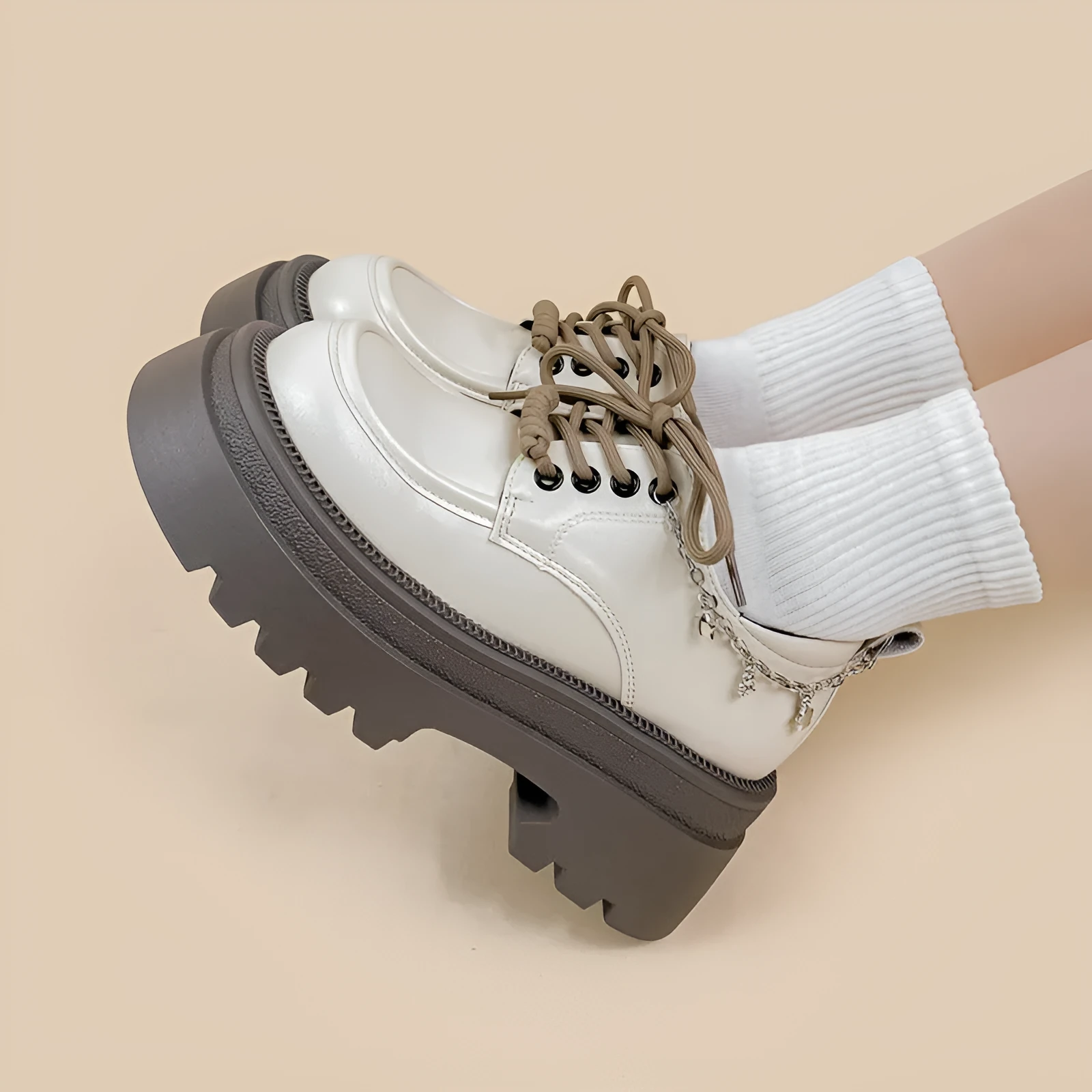 White women's platform Mary Jane shoes with round toe, front lace-up, and a chunky heel