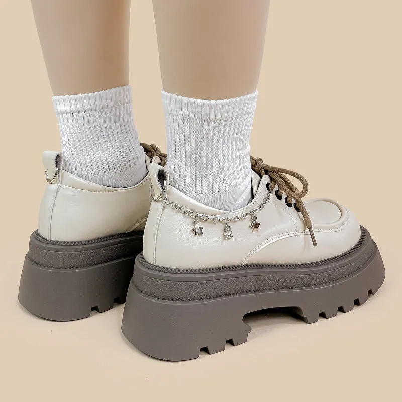 White women's platform Mary Jane shoes with round toe, front lace-up, and a chunky heel