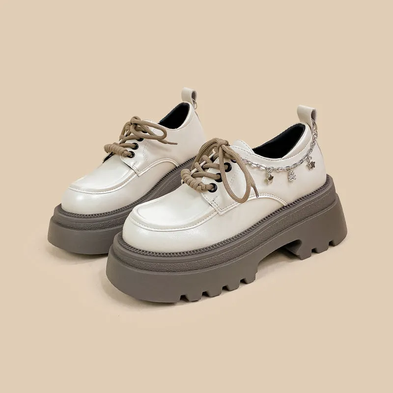 White women's platform Mary Jane shoes with round toe, front lace-up, and a chunky heel