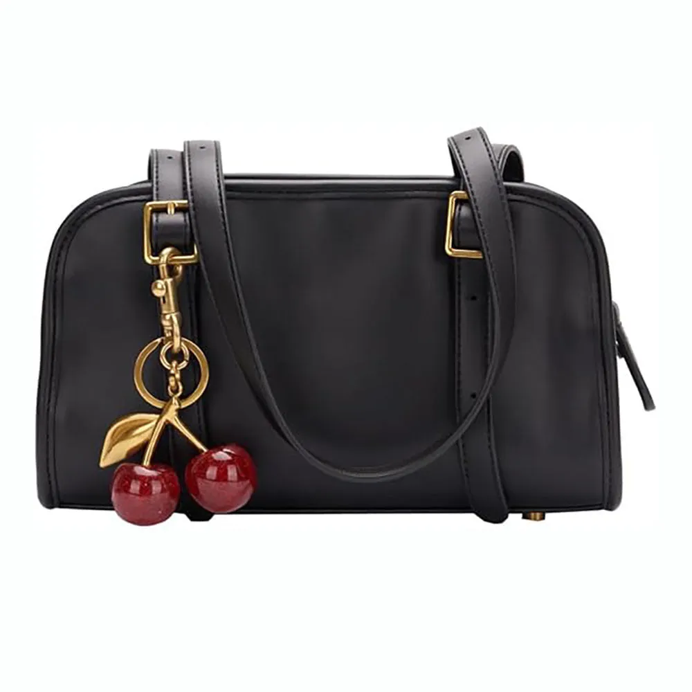 Red zinc alloy 3D cherry keychain pendant with metal loop for keyring attachment.