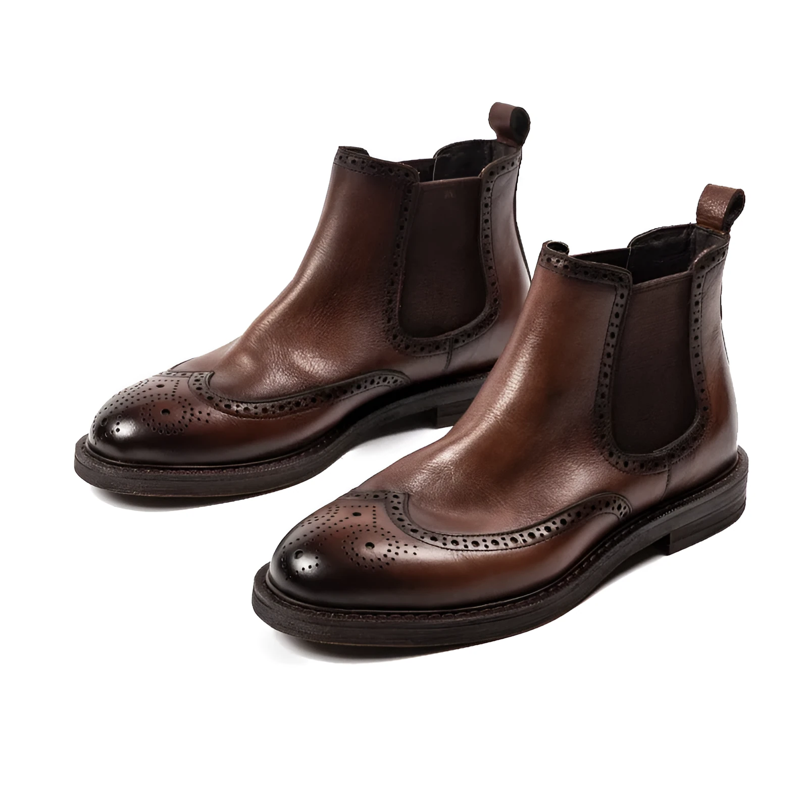 Men's black Chelsea boots with brogue carved genuine leather upper and rubber sole, side view