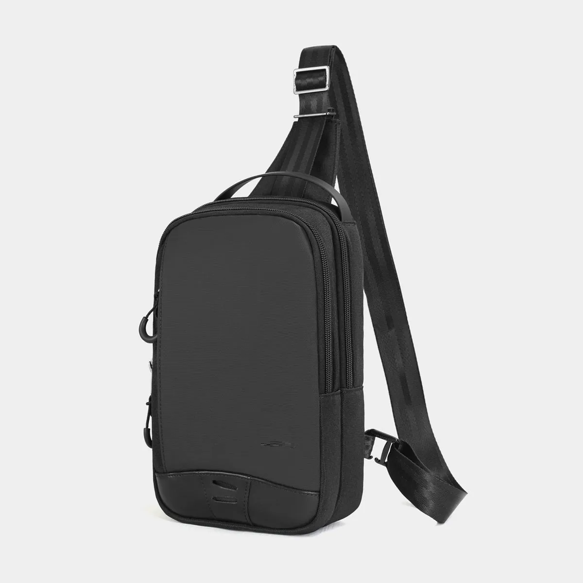 Casual black camouflage print chest bag with adjustable shoulder strap and top handle on a person