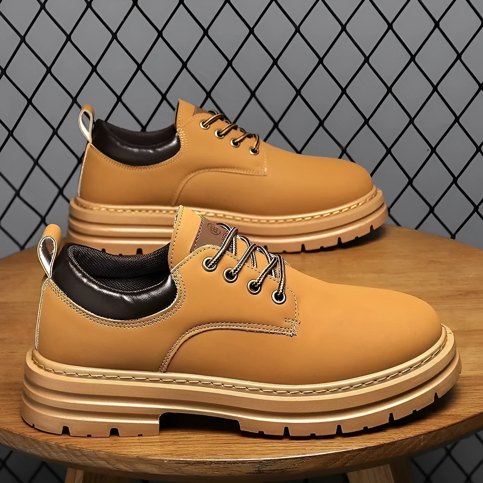 Men's breathable Martin platform boots in black with stitching details and rubber sole, low-top cut