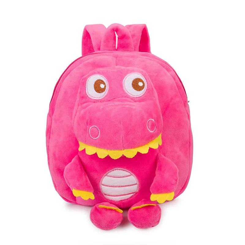 Soft plush dinosaur backpack for children with embroidery detailing in blue colour