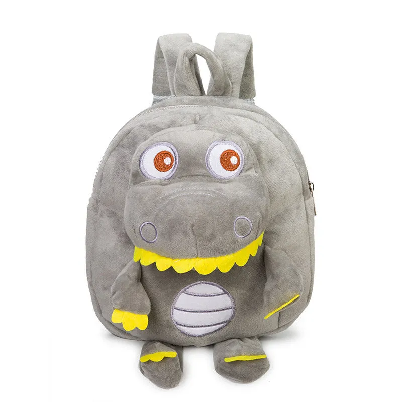 Soft plush dinosaur backpack for children with embroidery detailing in blue colour
