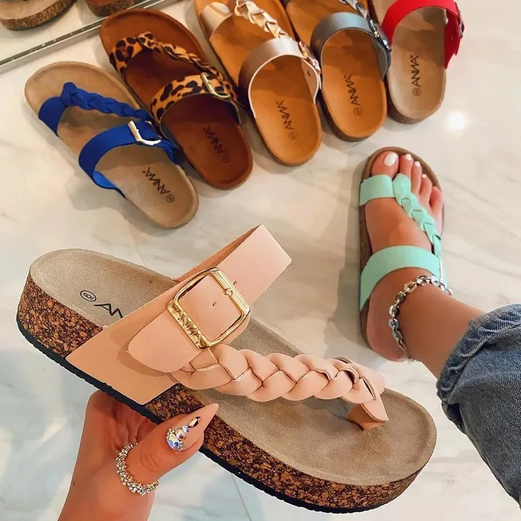 Cork flip flops for women with cow suede upper, rubber sole, decorative stitching, and belt buckle