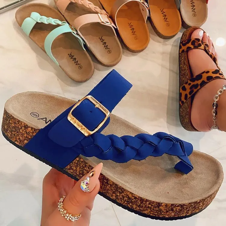 Cork flip flops for women with cow suede upper, rubber sole, decorative stitching, and belt buckle