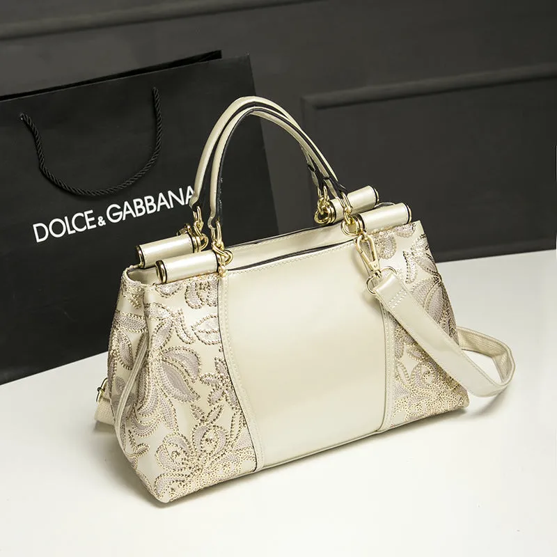 Patent leather handbag with sequin bead embroidery in blue, adjustable shoulder strap, crossbody style