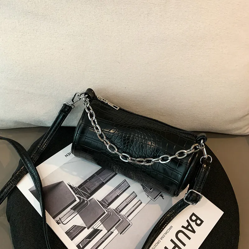 One shoulder cylinder messenger bag in beige PU leather with embossed crocodile pattern and zipper closure
